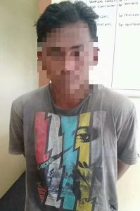 Tersangka RJ