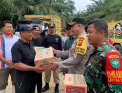 Kapolres Langsa Bantu Sembako bagi Korban Banjir